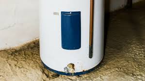 Residential water heater installed in a utility space